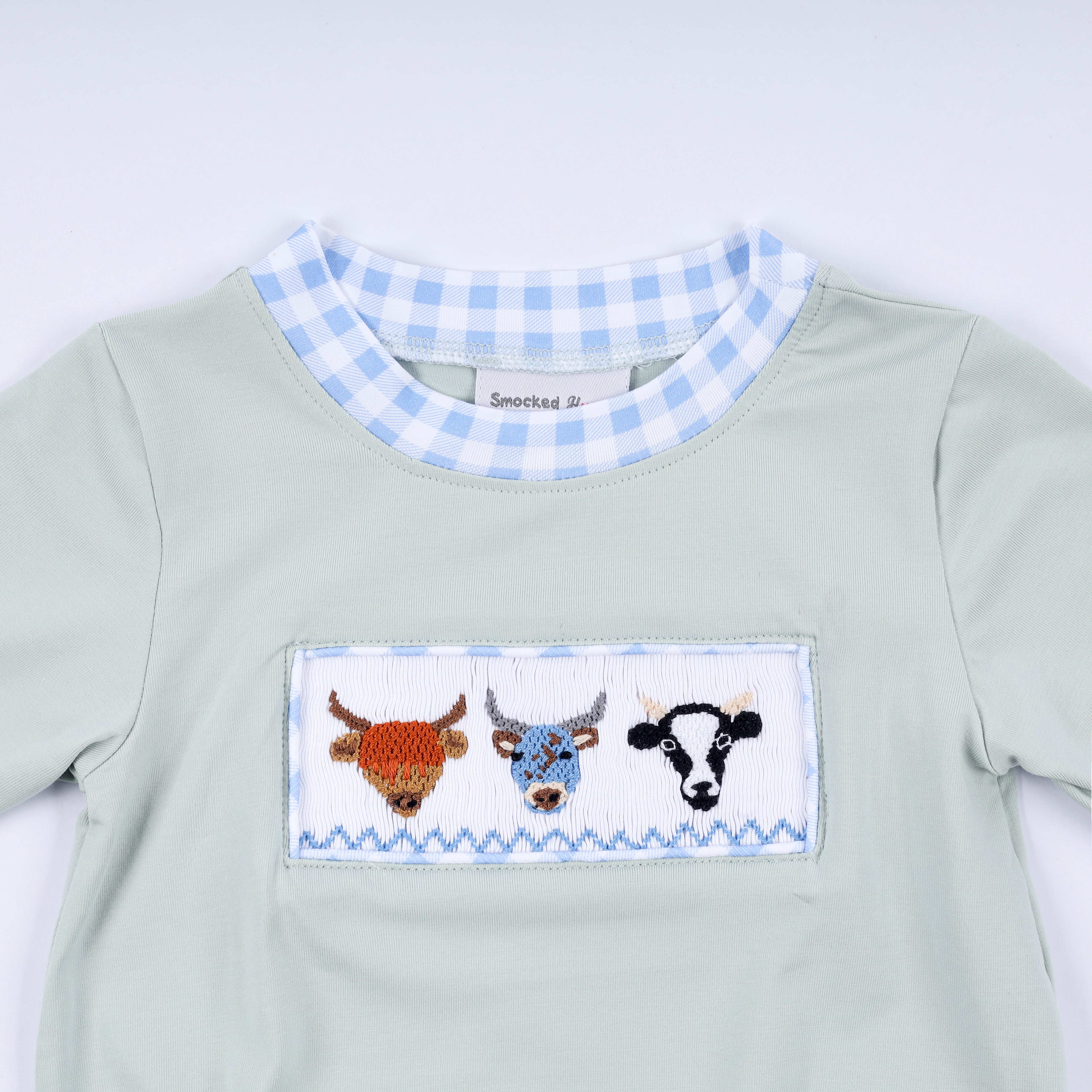 Sage cow hand smocked bubble