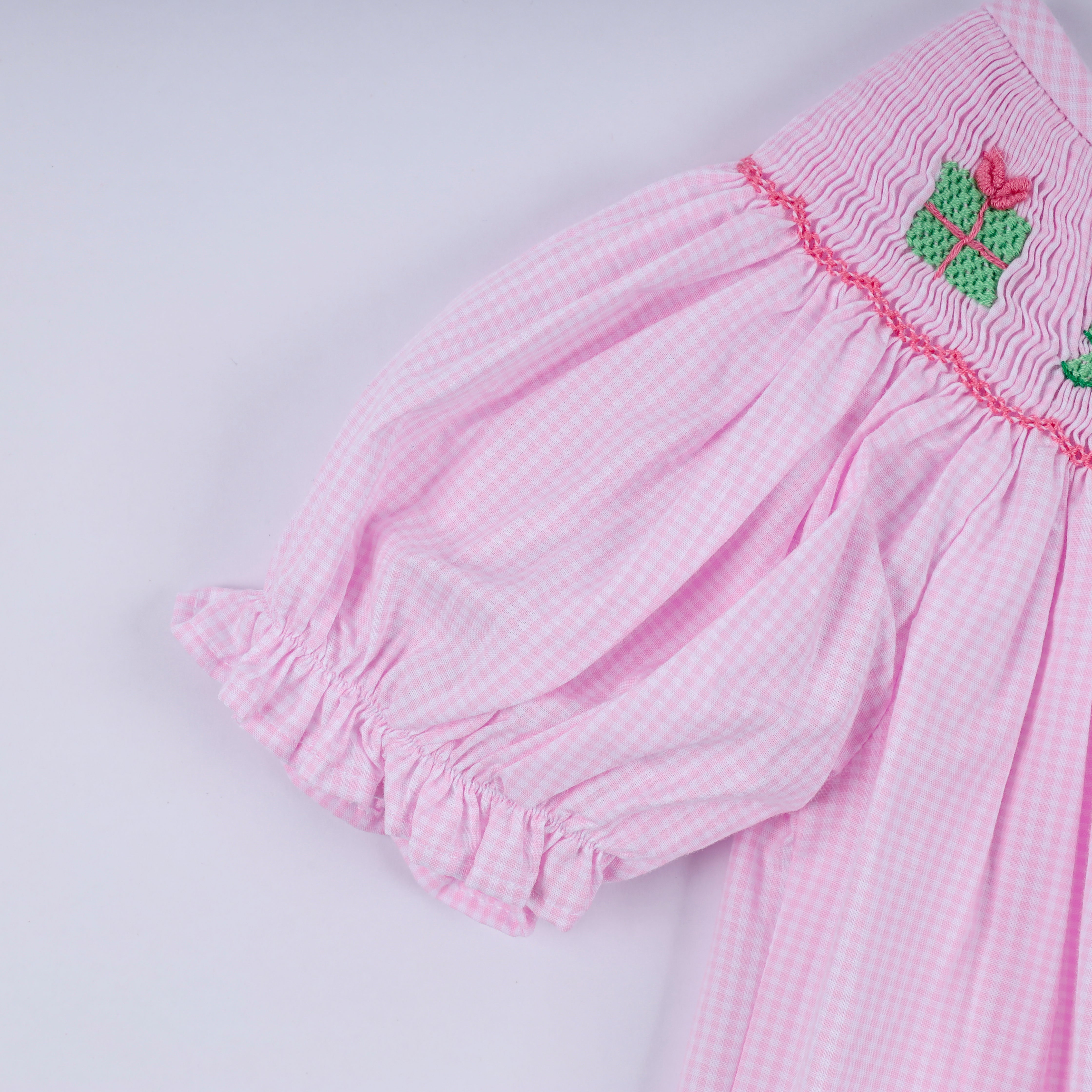 Pink christmas tree hand smocked ruffle romper